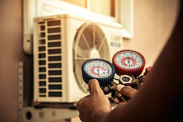 Professional Ductwork Repair technician working in Holbrook, MA